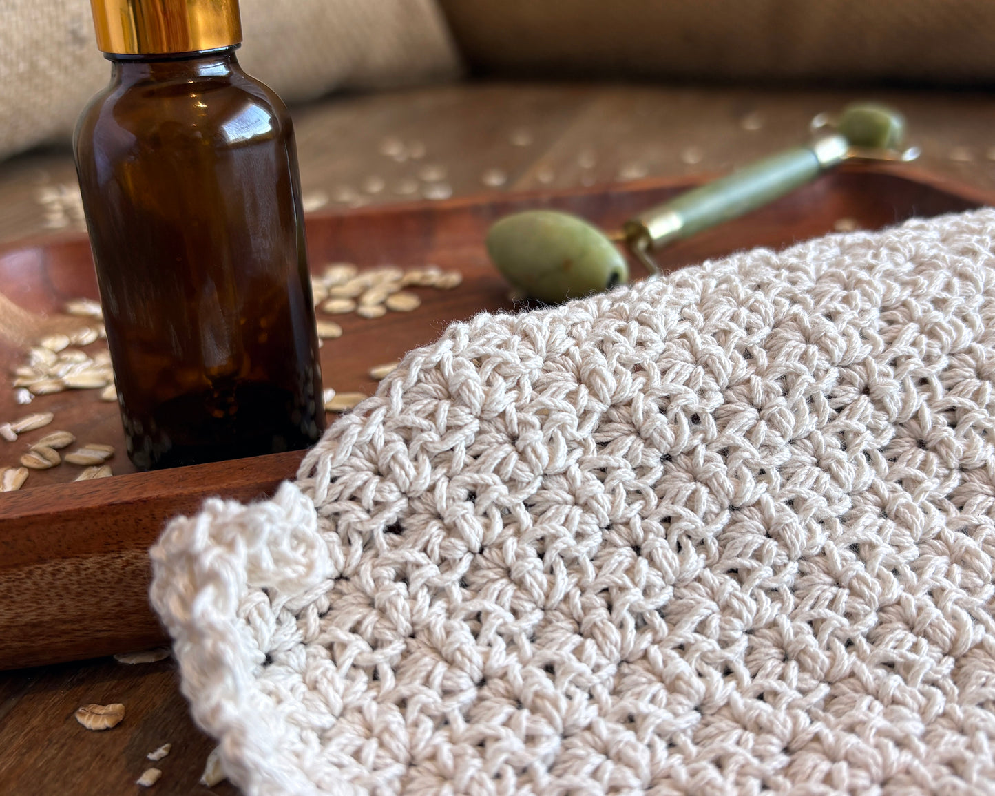 Close up of natural white crochet face cloth 