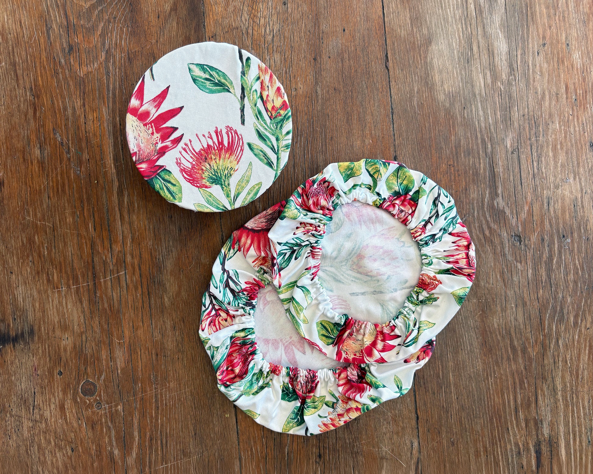 Protea of White Fabric -  Bowl Covers on wooden surface
