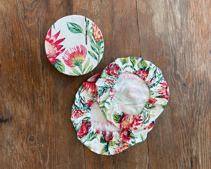Protea of White Fabric -  Bowl Covers on wooden surface